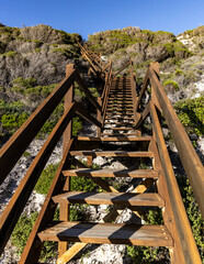 Long, steep wooden stairs leading up from Observatory Beach, Esperance, Western Australia.