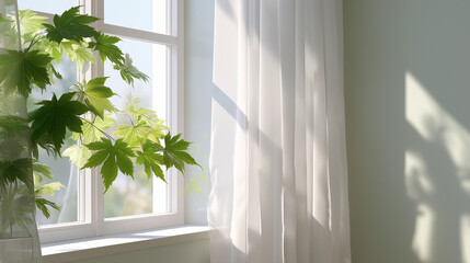 窓辺に差し込む朝の光と緑の葉のやさしい影