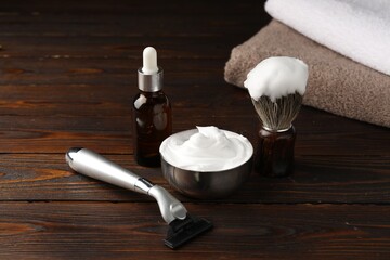 Different barber's tools on wooden background, closeup