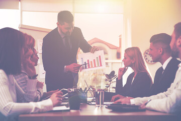 Group of coworkers working together in office