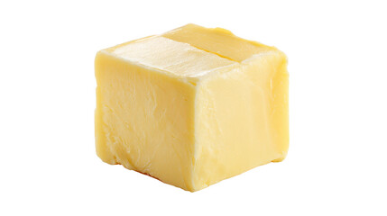 Block of butter rests on dark background solid golden butter block presented against deep black backdrop