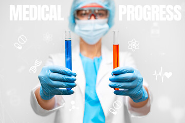Researcher in lab coat holds colored test tubes representing medical progress in healthcare