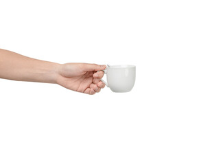 A person's hand extending and holding a plain, white ceramic coffee cup with a small white spoon inside. Isolated on a clean white background, this image conveys concepts of service Isolated.
