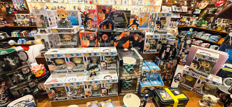 Colorful collection of anime figurines and merchandise in a vibrant store
