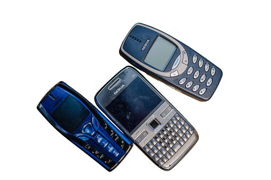 Riga, Latvia - October 24, 2025: Vintage Nokia mobile phones displayed together showcasing classic design and nostalgic technology from the early 2000s