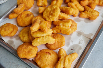 Crispy Deep-Fried Dough Stacked at a Street Vendor 