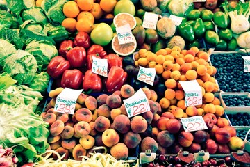 Fruit and vegetables in Wroclaw Market Hall. Retro filter photo color style.