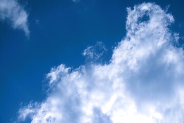 Bright White Cumulus Clouds Against a Deep Blue Sky.