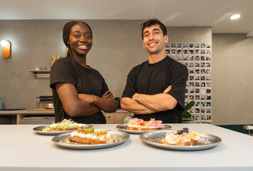 Multiethnic business owners smiling preparing various toasts