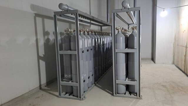 fire suppression gas cylinders stored in industrial safety room