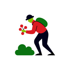 Person with backpack picking berries from a bush