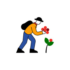 Farmer picking ripe red berries from a plant with green leaves