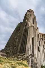 view of the landmark Panska Skala basalt column rock formation in the north of the Czech Republic