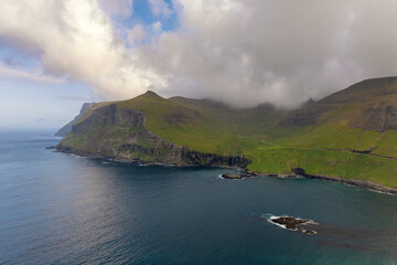 view of Sorvagsfjord and the rugged coastline of Vagar Island in the Faroe Islands