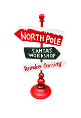 A festive Christmas directional signpost with arrows pointing to "North Pole," "Santa's Workshop," and "Reindeer Crossing." Red, white, and green, and isolated on a white background