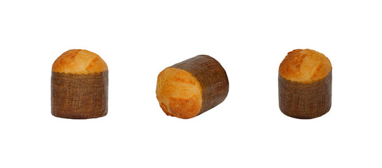 A horizontal set of three Panettone Christmas cakes in various orientations, wrapped in their paper liners. Perfectly isolated on a white background for holiday or Italian food concepts