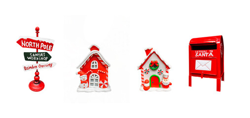 A horizontal set of four Christmas elements, including a North Pole signpost, two gingerbread houses, and a Santa mailbox. Perfectly isolated on white for holiday design concepts