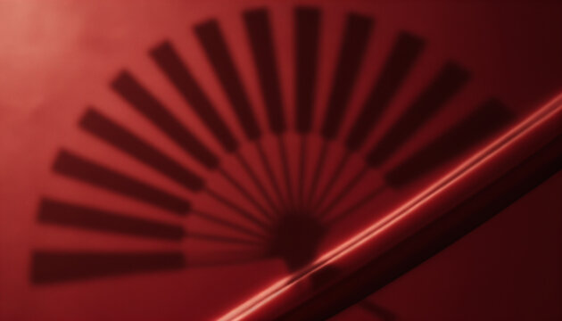 Red fan casting shadow on wall with reflection, background for Lunar New Year  