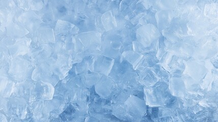 Obraz premium Crushed ice texture with light blue tone and soft frost. Refreshing frozen background with copy space. Perfect for drink, cocktail, summer, bar, beverage, freshness, or cooling concept.