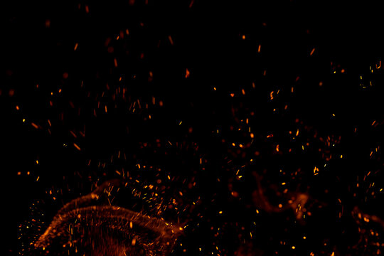 A black background with a lot of fire and smoke