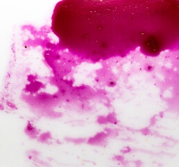 Obraz premium A white background with a pink stain