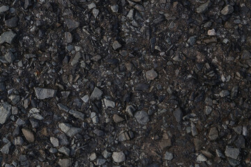 Crushed gravel with a rough, granular texture