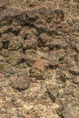 Scattered rocks and pebbles on the ground of the desert, in La Candelaria desert, in the eastern Andean mountains of central Colombia, near the town of Raquira.