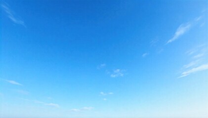 A wide angle view of a clear blue sky transitioning to softer hues with sparse, ethereal wisps of clouds. A horizonless, wide angle view of a serene blue sky exhibiting subtle color gradients. Sparse,