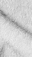 Crinkled gray cotton material with visible details