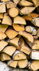 Fototapeta premium stacked chopped birch wood. background