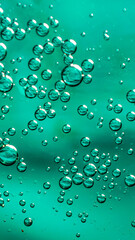 oil drops on water on blue background