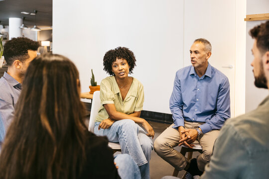 Diverse business team collaborating in an office meeting - Powered by Adobe