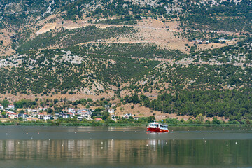 Ioannina, Greece - August 21, 2025: A lake near the city of Ioannina in Greece