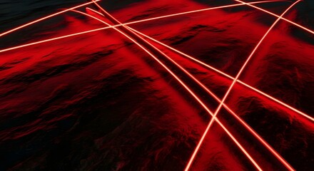 Dynamic abstract image featuring multiple vibrant red light trails intersecting over a deep red and black textured backdrop, creating a futuristic and energetic visual.