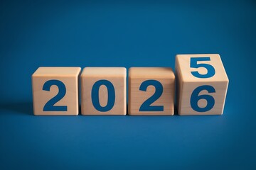 Wooden Blocks Displaying the Transition from Year 2026 to the Year 2025