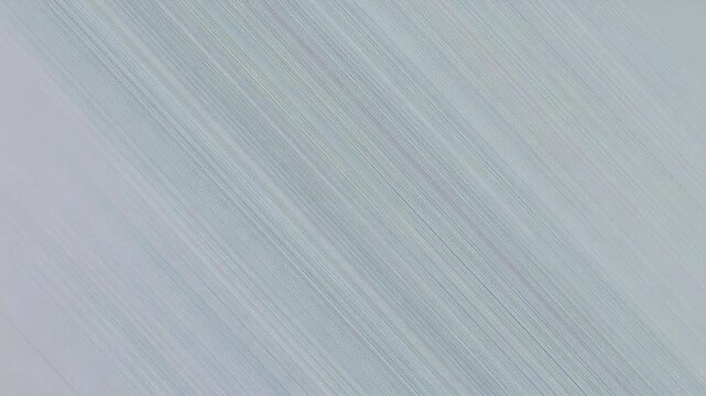 Subtle Diagonal Brushed Metal Texture with Faint Colored Streaks background metallic