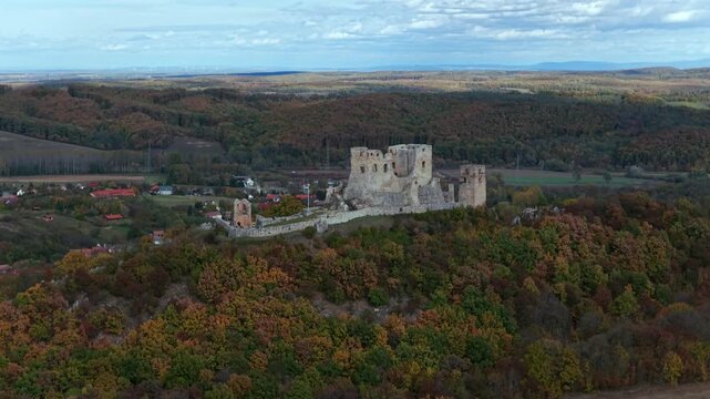Csesznek castle ruins in Bakony Mountain Hungary. 
Amazing fall landscape video about this historical place