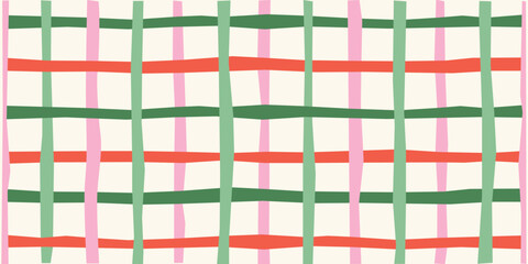 Seamless plaid pattern in a colorful hand-drawn style, a geometric checkered background for textile, wrapping paper, or cute fabric design, vector illustration.