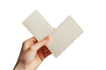 Hand holding blank cream cards isolated on a transparent background