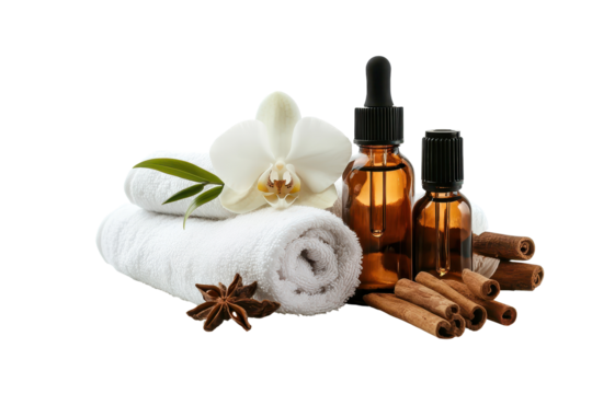 Elegant brown glass dropper bottles arranged with white towels and natural elements for a serene, calming spa experience