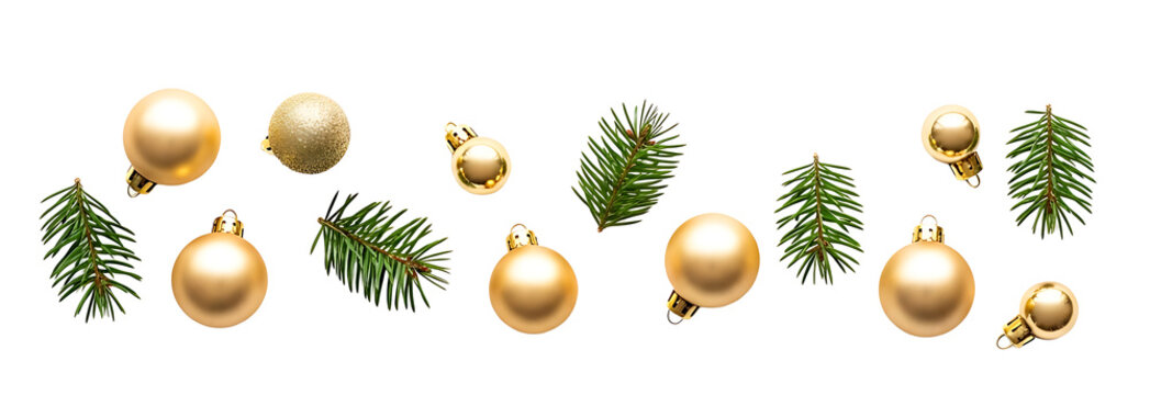Festive golden christmas ornaments and green fir branches arrangement