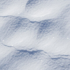 Obraz premium Close up texture of soft white and blue snow drifts