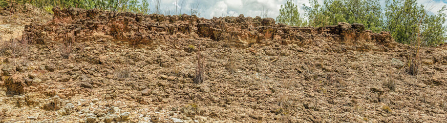 The stone formation and erosion of the desert ground; panoramic composite captured in the La Candelaria desert, in the eastern Andean mountains of central Colombia, near the town of Raquira.
