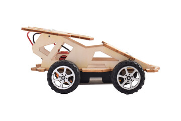 Wooden DIY toy car isolated on white background for education and STEM learning themes.