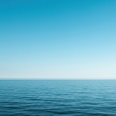 Fototapeta premium Expansive ocean meeting a clear sky at the distant horizon, creating a serene and vast natural landscape. Perfect for backgrounds ,daylight ,peaceful ,landscape