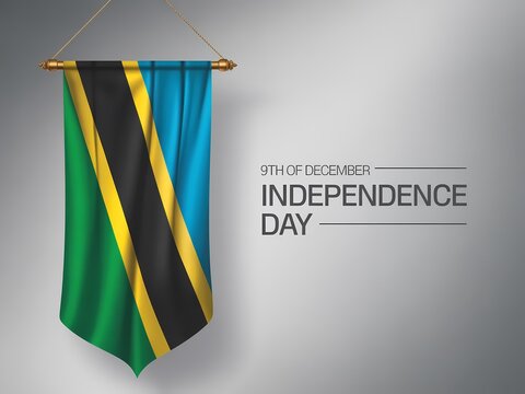 Tanzania national flag displayed vertically on a textured wall for independence day celebration