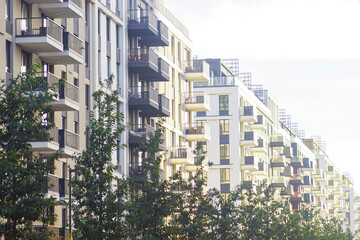 Street with residential buildings with balconies and glass facades in Belgrade Waterfront district. Concepts of urban lifestyle, contemporary housing, European modernism, and smart city development.