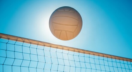 Volleyball in Air Above Net on Sunny Blue Sky