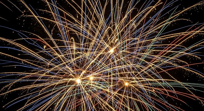 Dazzling Golden Fireworks Burst Dynamic Multicolored Light Trails Illuminating Dark Night Sky.