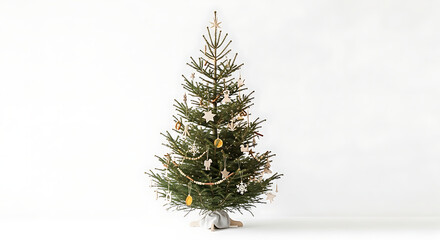 Elegant Christmas tree adorned with wooden decorations on a white background.